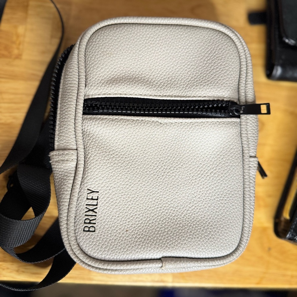 Cream Belt Bag with Textured Leather and Rounded Corners